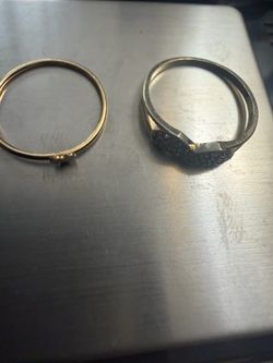 2 anillos de oro uno de 14k y otro de 10k