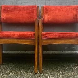 A pair of upholstered armchairs