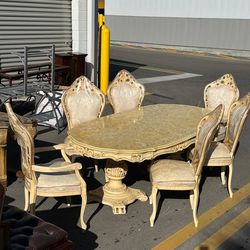 Dining table with 6 chairs and china cabinet in good condition