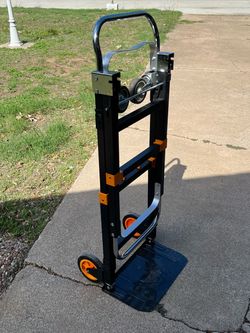 3-in-1 convertible folding steel hand truck with a capacity of up to 600 pounds and orange-colored accents.