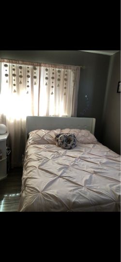 Bed frame with base and mattress