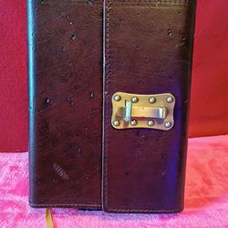 brown leather journal with a metal latch
Handmade in Italy beautiful leather from Barnes & Noble 