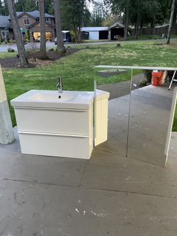 White Wall sink and mirror vanity pair