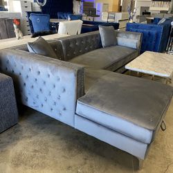 Elegant grey sectional couch with storage chaise • Furniture of America 