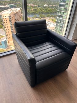 Black faux leather chair