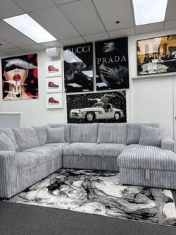 Plush Corduroy Sectional w/Pull out bed & Storage & Cup holder 