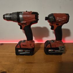 MILWAUKEE SURGE IMPACT AND HAMMER DRILL WITH 2 - 5.0 BATTERIES FOR SALE!
