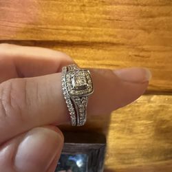 Women’s diamond engagement/wedding rings