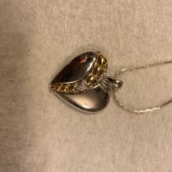 Sterling Silver Heart Shaped Pendant With Gold Plated Heart Trail 