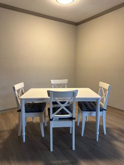 White Dining Table & 4 Cross-Back Chairs (Cushions Included)