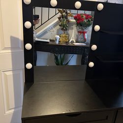 vanity desk with mirror lights.