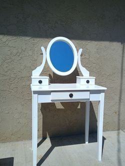 White Vanity Table with Oval Mirror and Drawers