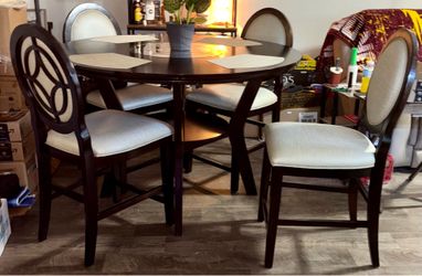 54” Counter Height Dining Table and Four Chairs with Built-in Lazy Susan