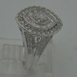 14kt white gold engagement ring 4.8 grams size 7 w 1 carat of diamonds total . 1 marquise diamonds approximately 0.10-0.12 pts ; 2 round diamonds 0.05