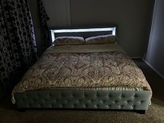 King bed w/ mattress.