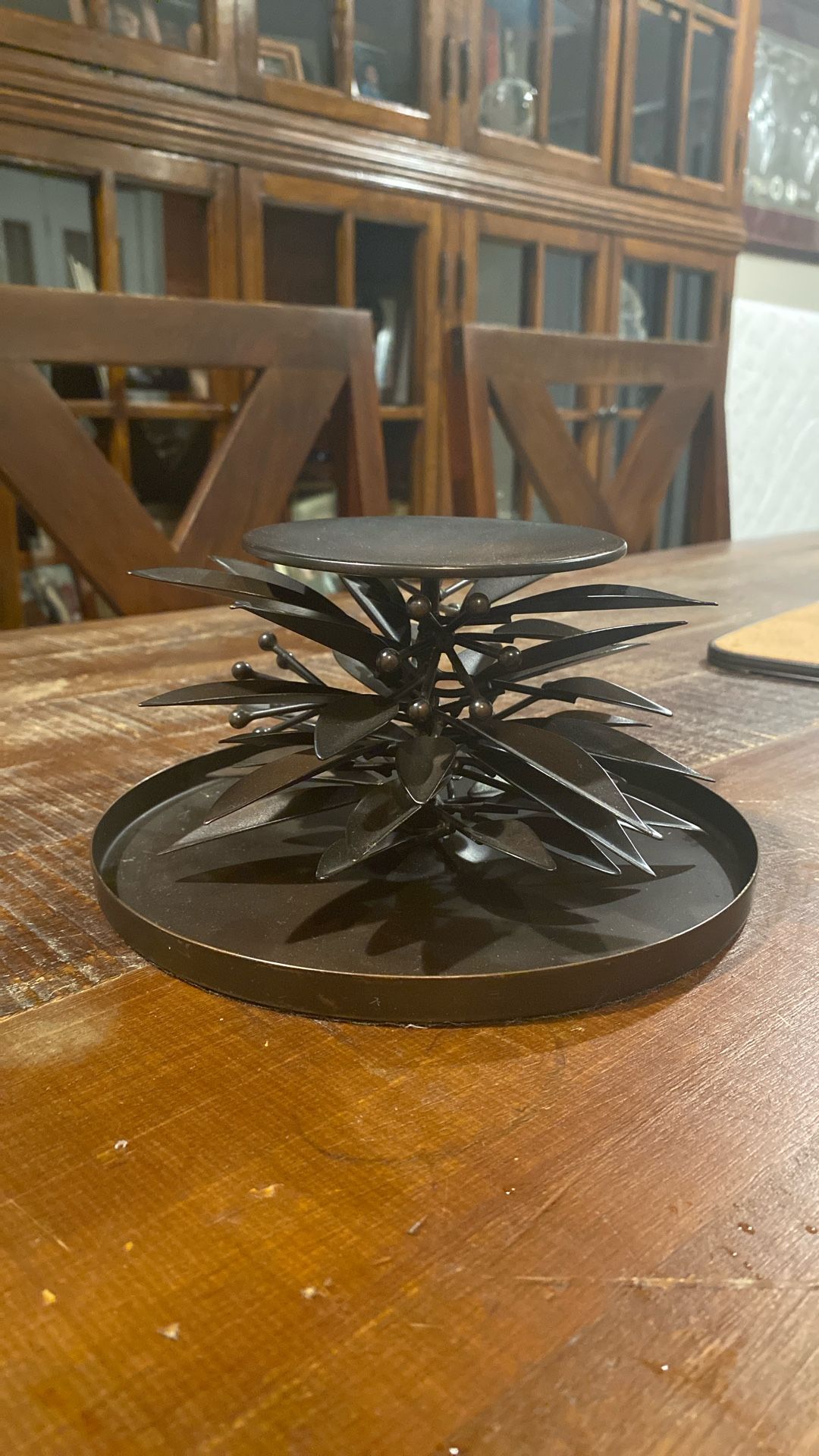 very nice base for a candle measures 4" tall