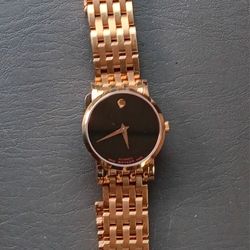 Movado Red Label automatic watch for women, with a black dial and rose gold accents.
Swiss Made
Very rare model
