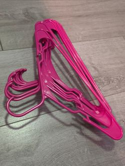 10 hot pink plastic hangers