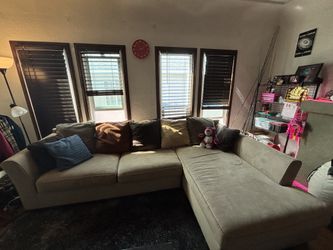 Tan multi sectional couch