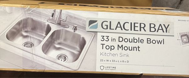 Glacier Bay 33 in. Drop-In 50/50 Double Bowl 20 Gauge Stainless Steel Kitchen Sink has a dent in corner