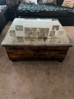 Rustic coffee table with glass top