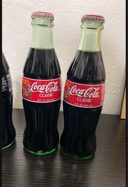 Coca Cola 8oz Christmas edition bottles