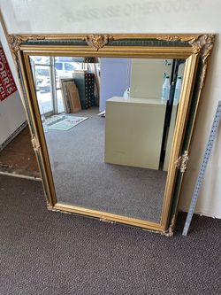 LARGE ORNATE SOLID WOOD FRAMED MIRROR – 37” × 47”