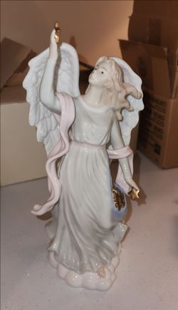 Angel With Stars Porcelain Figurine