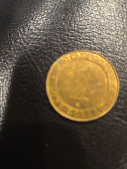 1$ car wash token