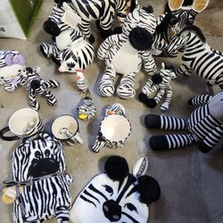 Zebra Stuffed Animal, Cups, Piggy Bank. 