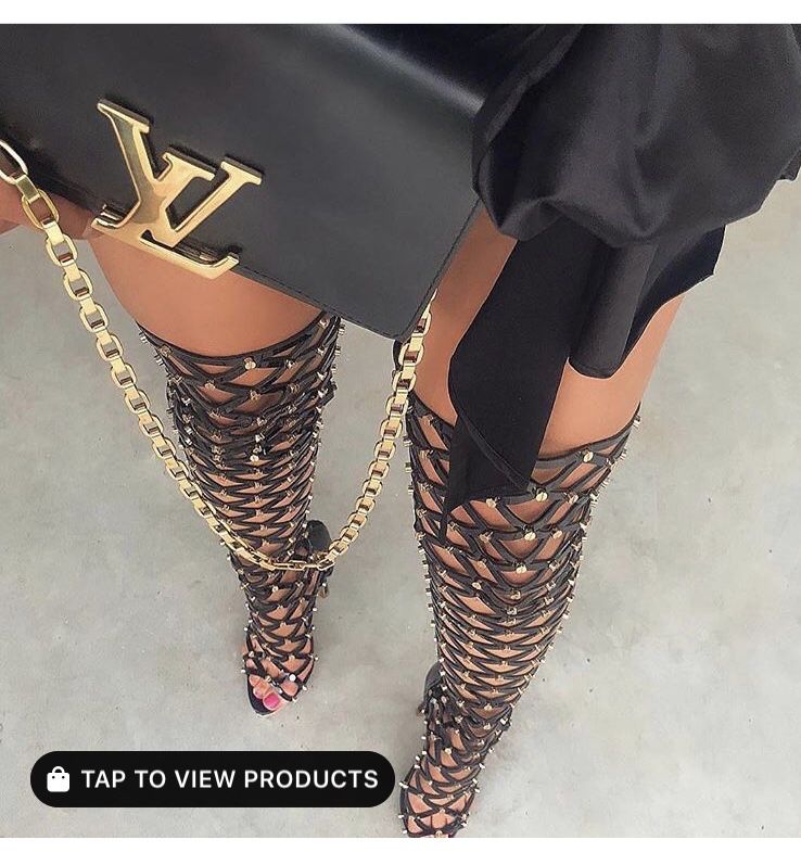 Thigh high black and gold studded sandal heels