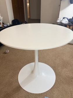 Round table with 4 chairs.