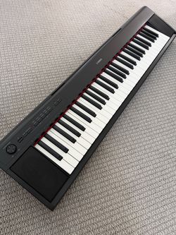 61 key portable Yamaha Piano