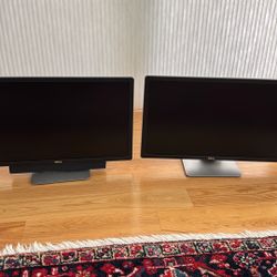 2 Dell 27” Computer Monitors with Stands.