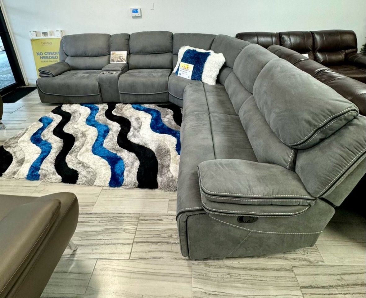 Limited time. Alejandro Gray modular reclining sectional only $1599. Easy finance option. Same day delivery.