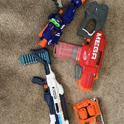 Nerf play guns with a few accessories