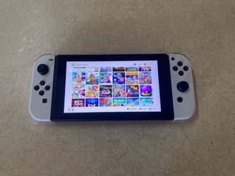 Nintendo Switch V2 with 125 Switch Games + 7500 Retro Classic Games