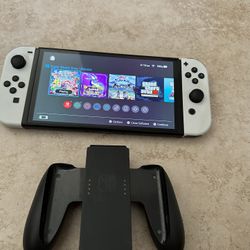 Nintendo Switch OLED w/ digital Super Smash Bros
