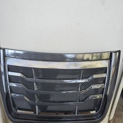 Carbon bonnet scoop fits any vehicle
