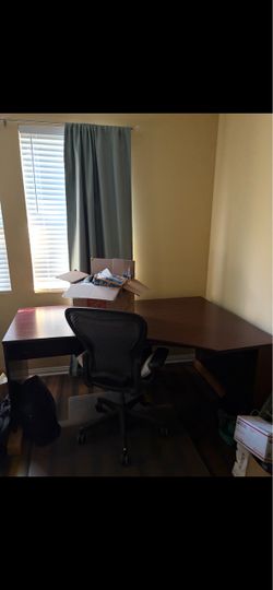 2 office desks and 2 office chairs