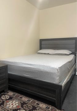 Queen sized wooden bed frame WITH mattress