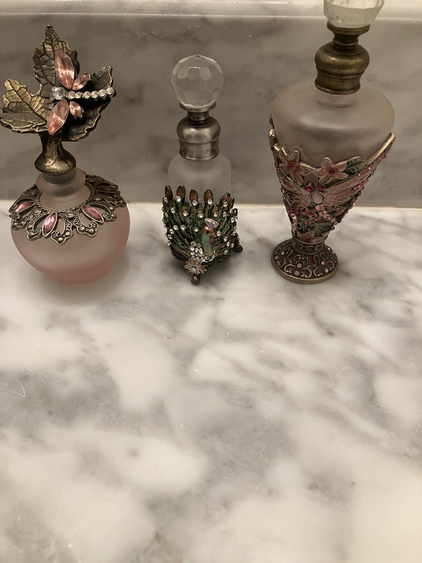 3 Beautiful Perfume Bottles