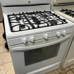 Five burner Kenmore gas stove