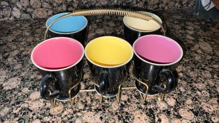 Vintage MCM Set Of 5 colored Mugs In Original Wire Caddy.