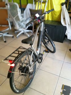 AiPas C2 Express ELECTRIC BIKE MOTOR 750W-28MPH-RANGE 68MILES
Aipas C2 Xpress Electric Bike, featuring a sleek silver frame, front suspension, and a r