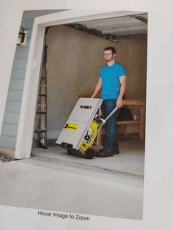 Portable corded table saw with rolling stand