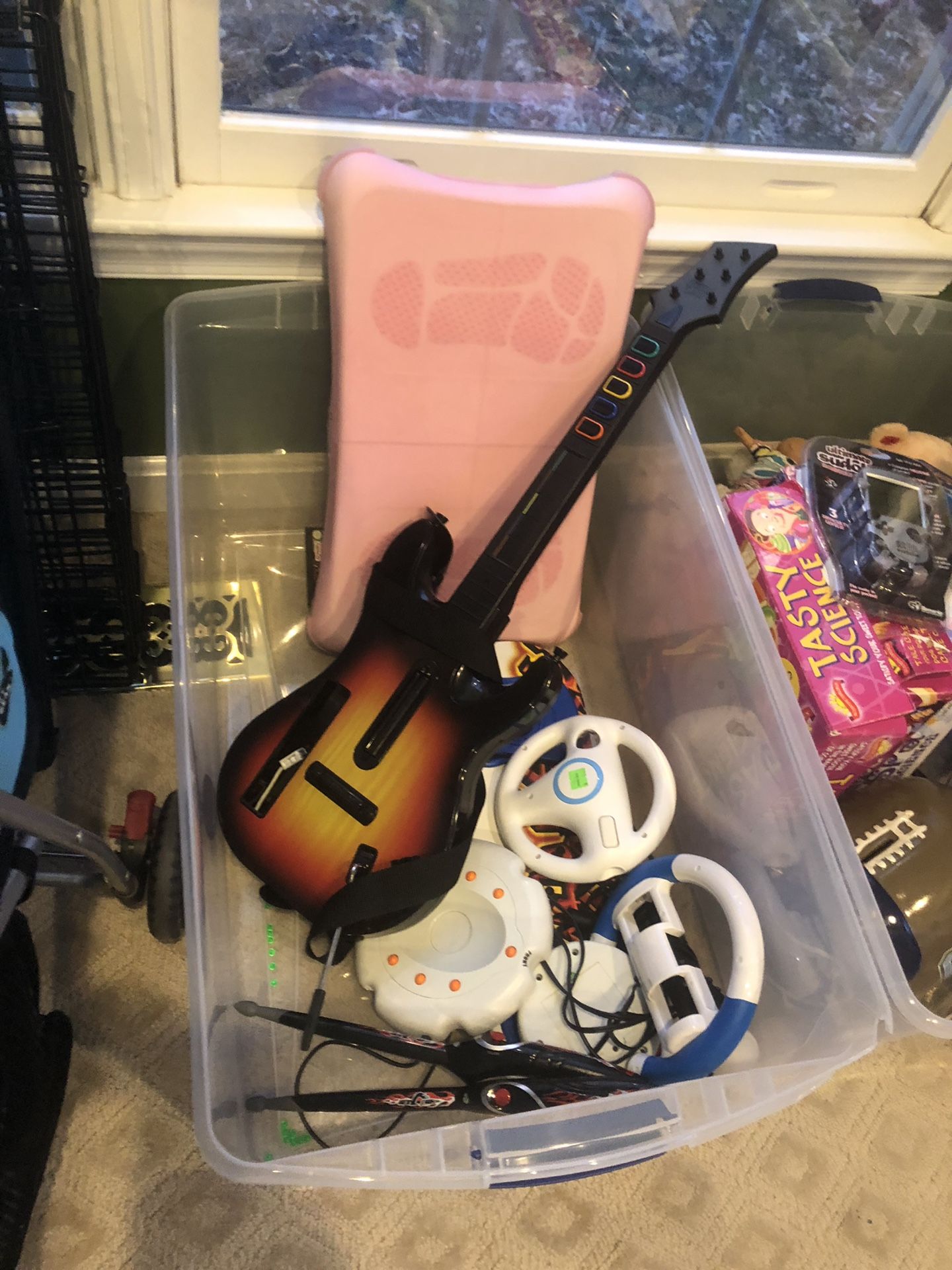 Assorted Wii stuff- guitar, balance board, driving accessories, snowboard, drumsticks etc!