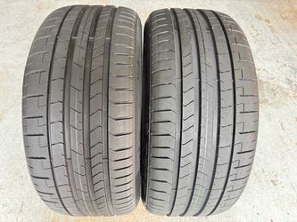 Two Tires 235/35/20 Pirelli P Zero PZ4 PNCS With 96-100% Left Tesla Model 3