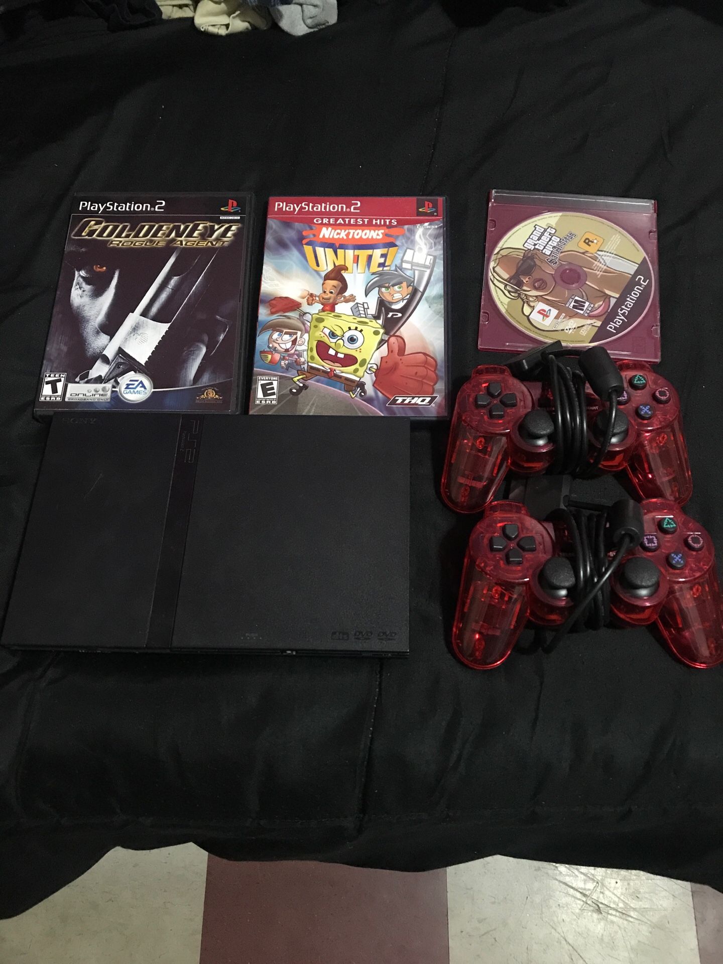 Ps2 with 3 games and 2 controllers