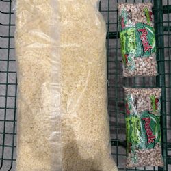 Large bag of Rice Krispies breakfast cereal, 2 bags of dried pinto beans, 3 cans of sauerkraut.